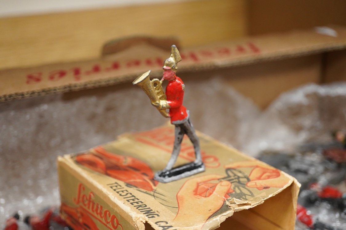 A collection of lead soldiers by Britains, etc. including Scottish Highlanders, together with a number of diecast military aircraft and a boxed Schuco Telesteering Car 3000